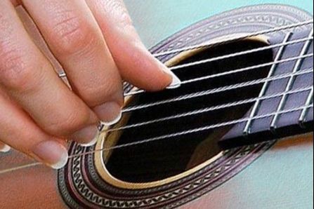 Guitarrista: Una mano portfolio