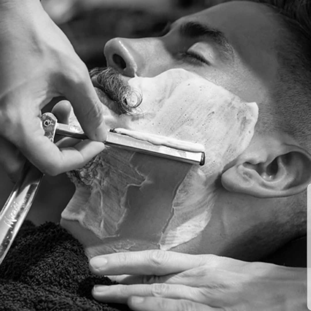 Traditional hot towel shave with blade portfolio